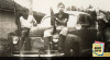Dua anggota TKR yang sedang duduk di depan mobil sesaat sebelum peristiwa Bandung Lautan Api terjadi 23 Maret 1946.