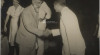 Penyambutan Duta Besar Afganistan pertama untuk Indonesia Abdul Hadi Dawi (kiri) oleh Kepala Protokol Kementerian Luar Negeri Kusumo Utojo di Lapangan Udara Kemayoran. Jakarta, 22 September 1954