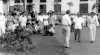 Menteri Penerangan Sjamsuddin Sutan Makmur (depan, no. 2 dari kanan) mendatangi Tempat Pemungutan Suara untuk menyambut Presiden Sukarno pada Pemilihan Umum anggota DPR RI. 26 September 1955.