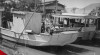 Foto kegiatan perbaikan perahu oleh Bengkel Perahu Jawatan Perikanan Laut yang berada di kawasan Pasar Ikan, Jakarta Utara pada 2 Juni 1951.