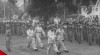 Gatot Soebroto berjalan memeriksa barisan untuk persiapan upacara penyerahan Markas Besar Militaire Luchvart (ML) kepada TRI Angkatan Udara, 23 Juni 1950.